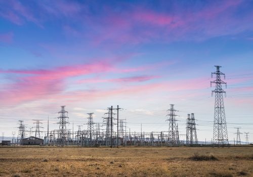 electric substation on the prairie with sunset glow