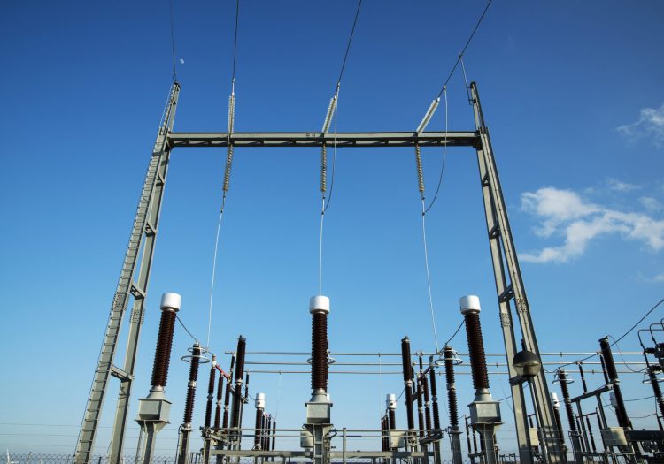 Low Angle View Of Transformers At Power Station